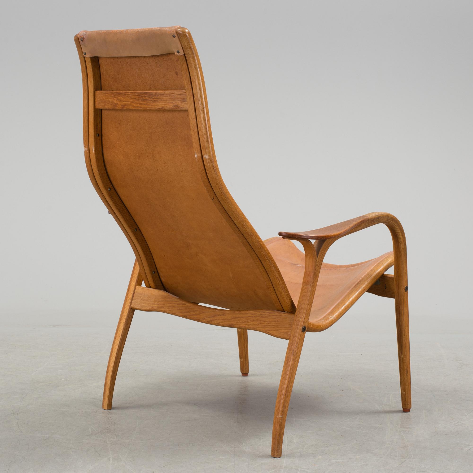 YNGVE EKSTRÖM, a 'Lamino' oak and teak easy chair from Swedese.