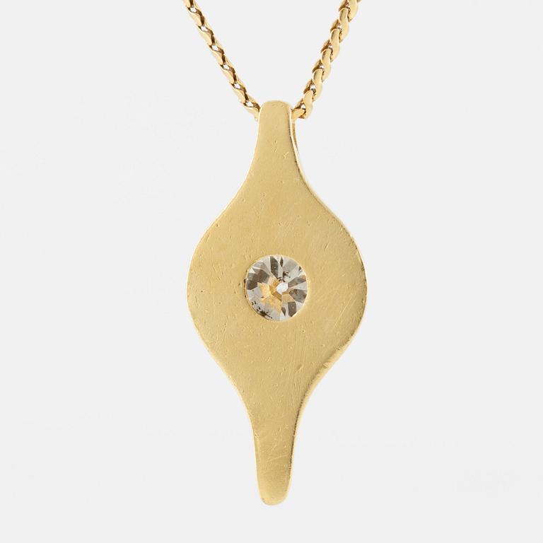 Pendant in 18K gold with a round brilliant-cut diamond.