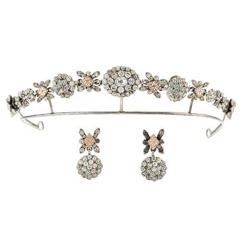 A silver and paste demi parure comprising a tiara and a pair of earrings, 19th century.