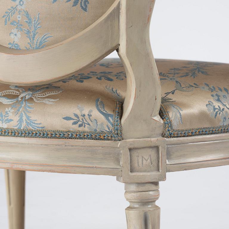 A pair of carved Gustavian chairs by J. Mansnerus (master 1756-1779).