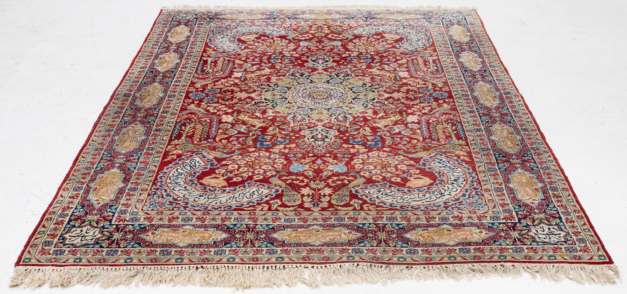 A semi-antique Kirman carpet, c. 275 x 180 cm.