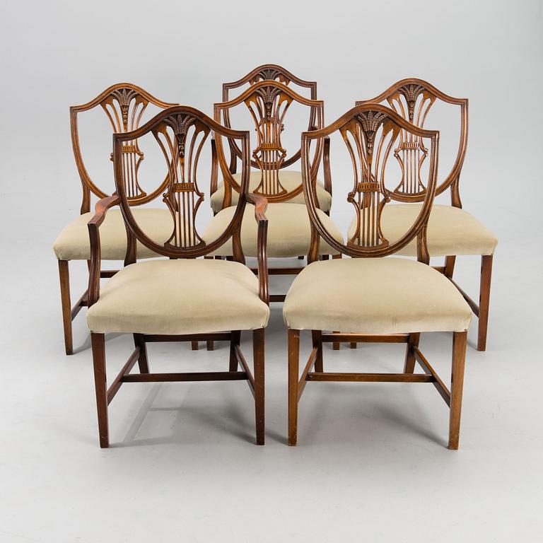 A set of 4+2 English 20th century chairs in  Hepplewhite style.