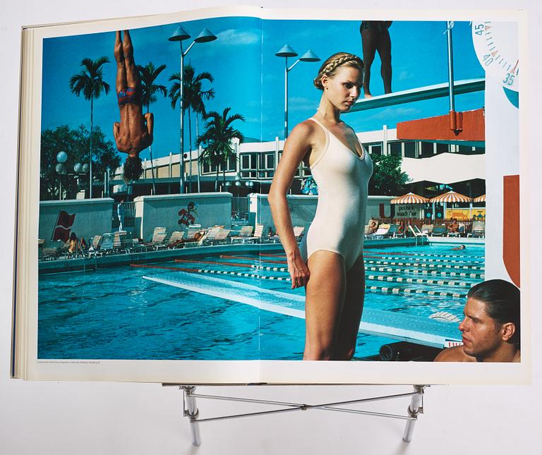 Helmut Newton, Signed book published by Taschen, Monte Carlo, 1999, ed 10000, with a metal table.