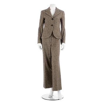 843. MAX MARA, a wool and silk a two-picee suit consisting of jacket and pants, size 38 and 42.