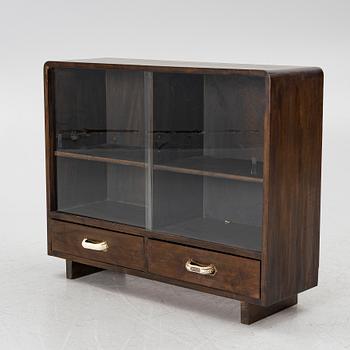 A bookcase, 1930s/1940s.