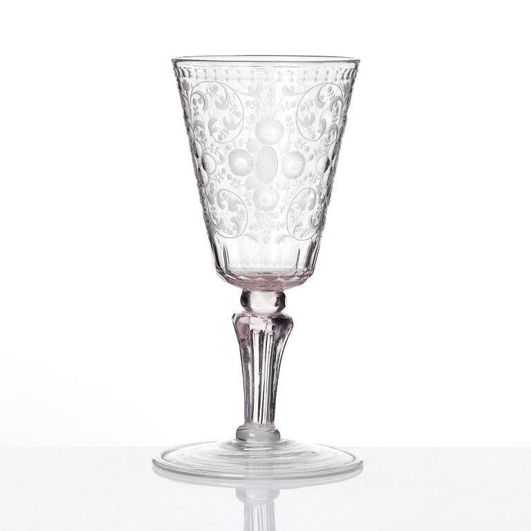 A large engraved and cut glass goblet, 18th Century.