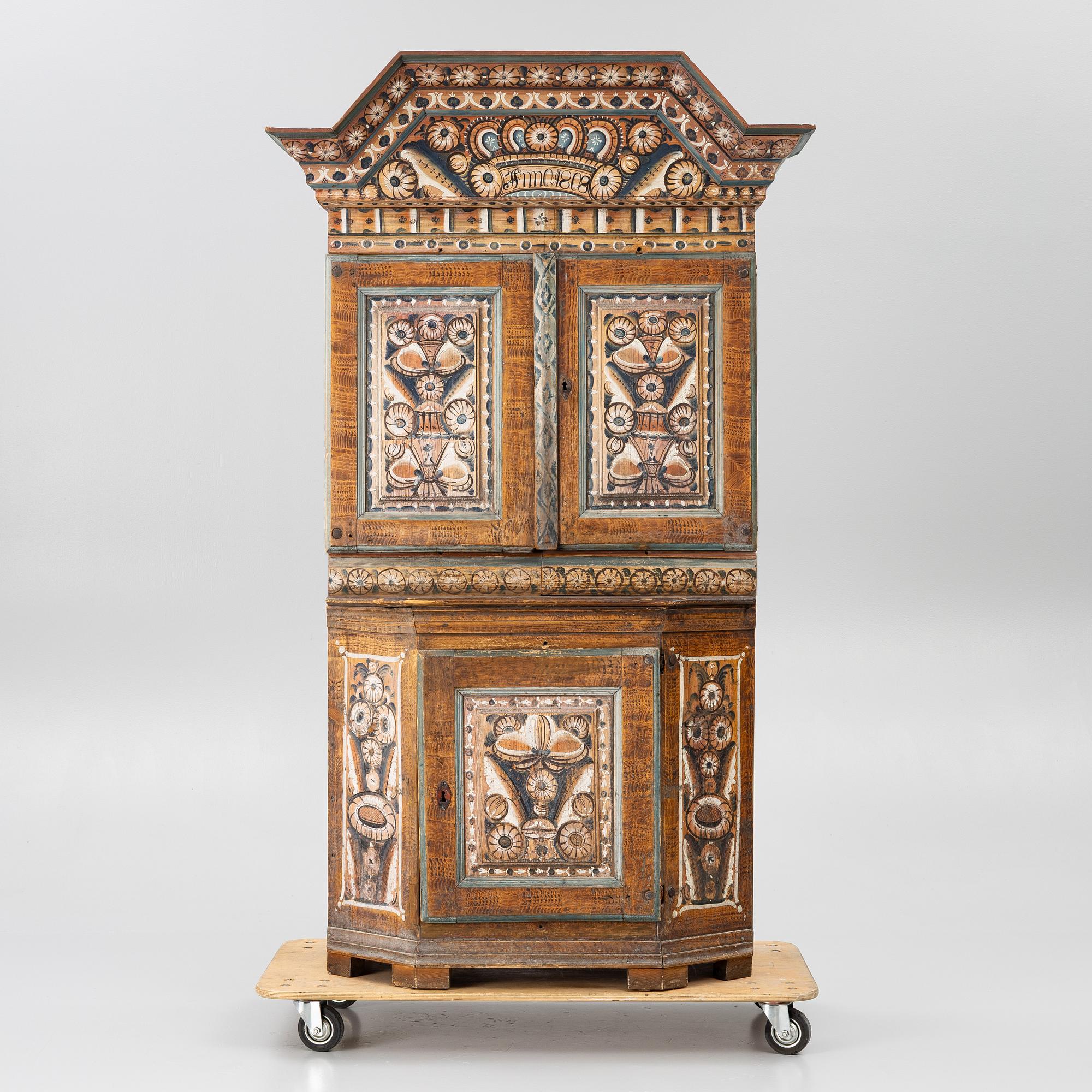 A Swedish Dalecarlian folk art cabinet dated 1808.