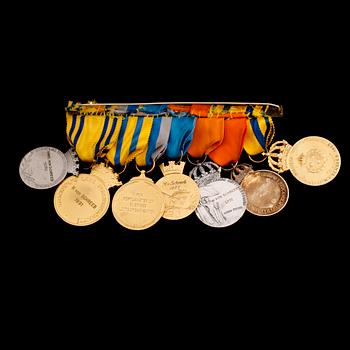 MEDALJER, 7 st, silver samt förgyllt silver. Total vikt ca 160 gram.