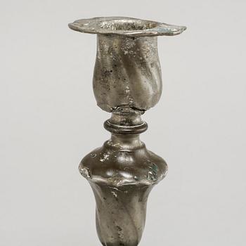 A pair of Rococo candlesticks in pewter, made by Eric Pettersson Krietz in Stockholm 1763.