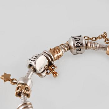 ARMBAND, silver samt guld med en briljantslipad diamant ca 0.01 ct, Pandora, Vikt 57,8 gram.