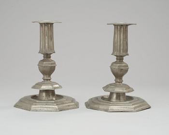A pair of English Baroque 17th century pewter candlesticks marked by Richard Booth of York England.