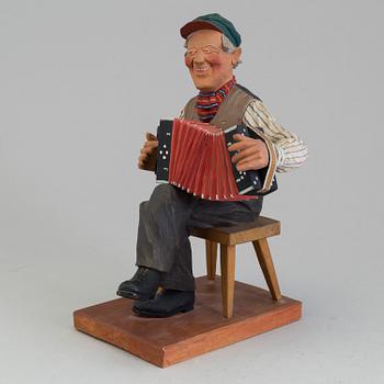 HERMAN ROSELL, a painted wood sculpture signed and dated 1940.