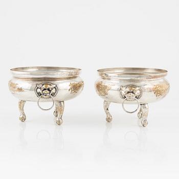 A set of two Chinese tripod silvered serving dishes,  20th Century.