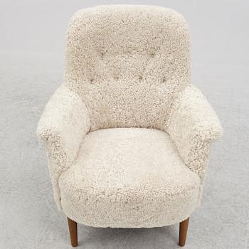 Carl Malmsten, a "Husmor" armchair, O.H.Sjögren, Tranås, 1984.