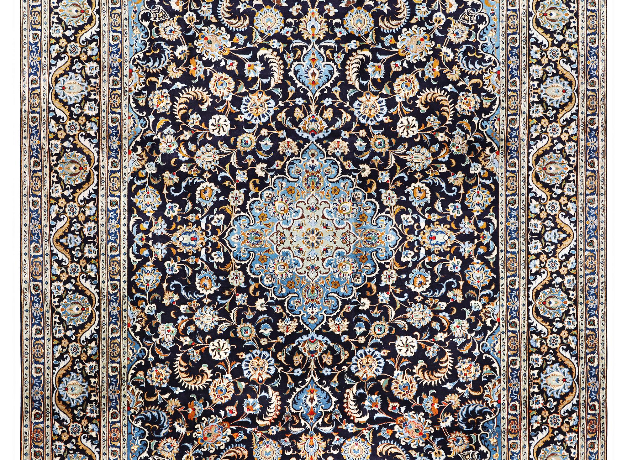 A Kashan carpet, c. 393 x 271 cm.