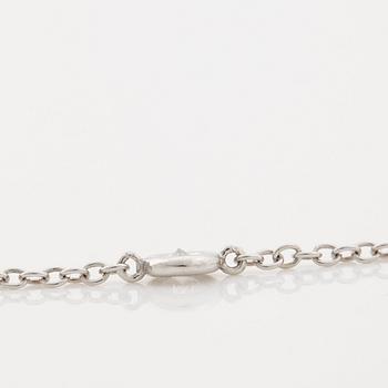 A brilliant cut diamond necklace.