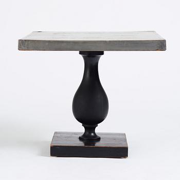 Uno Åhrén, a black lacquered table with a pewter top by Nils Fougstedt, Svenskt Tenn ca 1930. Alva & Gunnar Myrdal Collection.