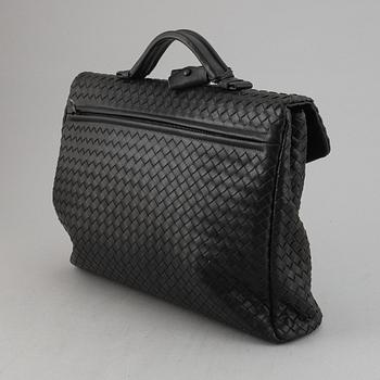 Bottega Veneta, a black intrecciato leather briefcase.