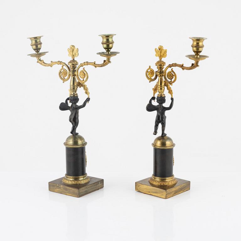 A pair of bronze candelabras, second half of the 19th century.