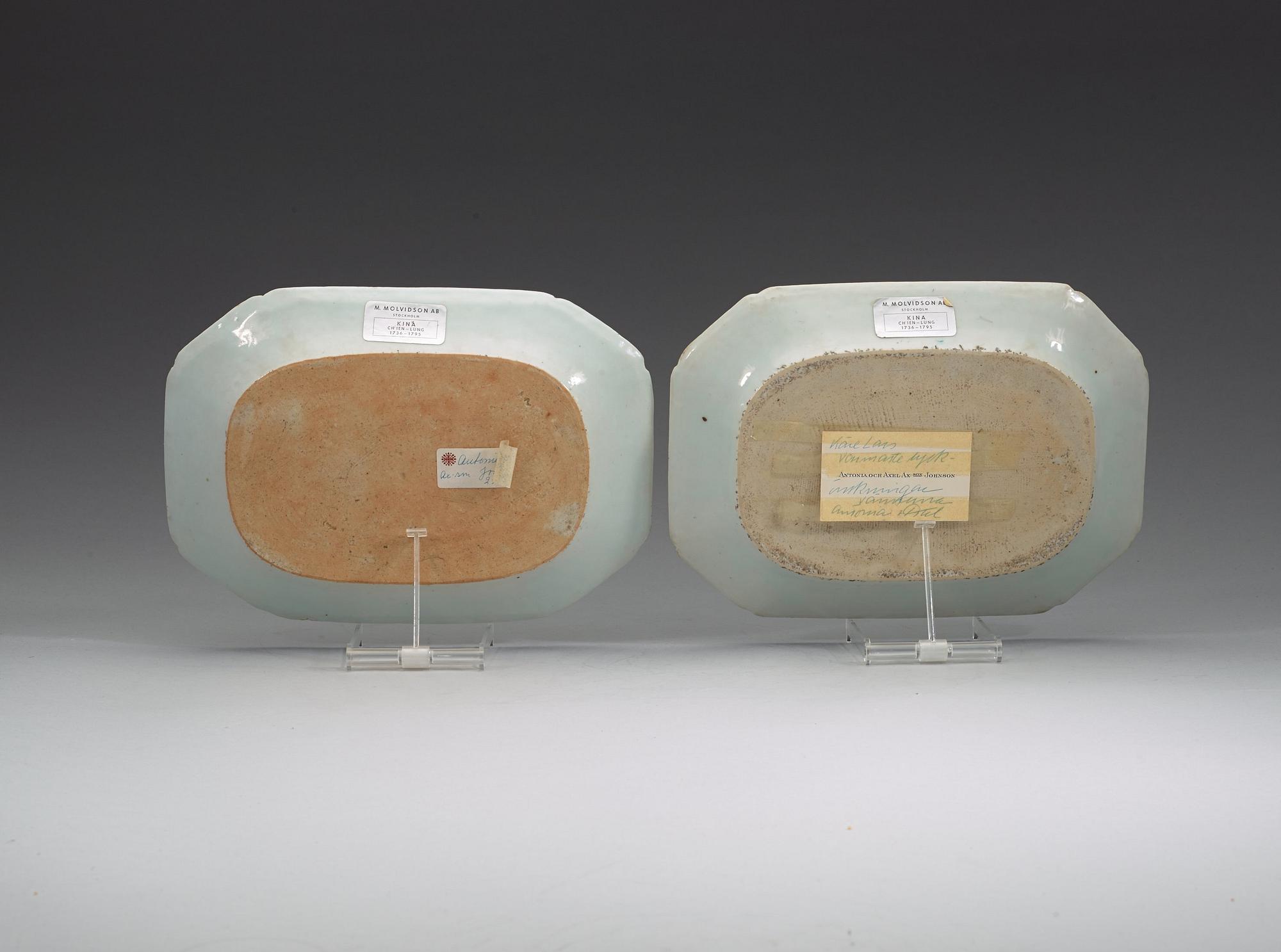 A pair of famille rose 'double peacock' serving dishes, Qing dynasty, Qianlong (1736-95).