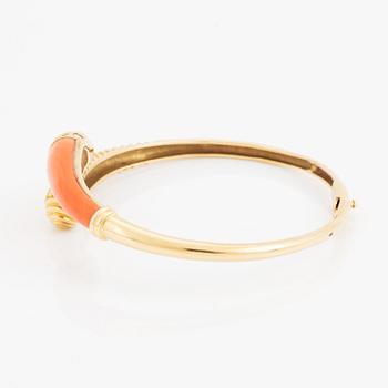 Gold and coral and diamond bangle.