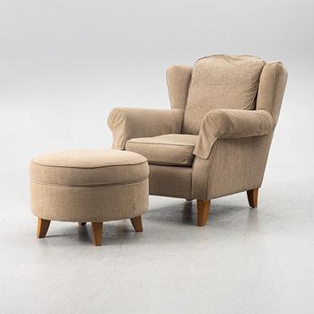 An armchair with footstool, Howard model, Englessons, 21st century.