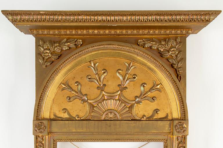 A Swedish Empire Mirror frame and console table, first half of the 19th century.