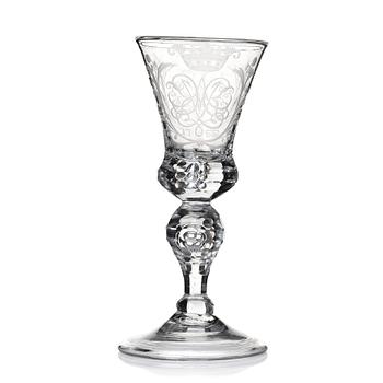 322. A cut and engraved glass goblet, dated 1755.