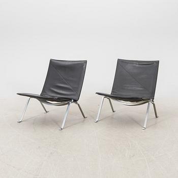 A pair of "PK22" leather armchairs by Poul Kjaerholm for E Kold Christensen, Denmark.