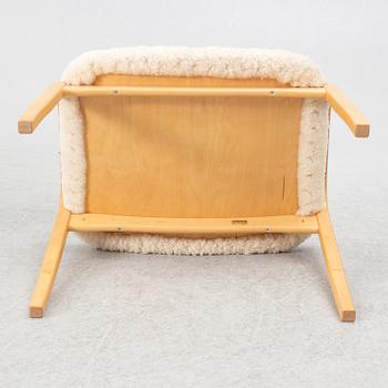 Yngve Ekström, armchair with footstool, "Lamino", Swedese.