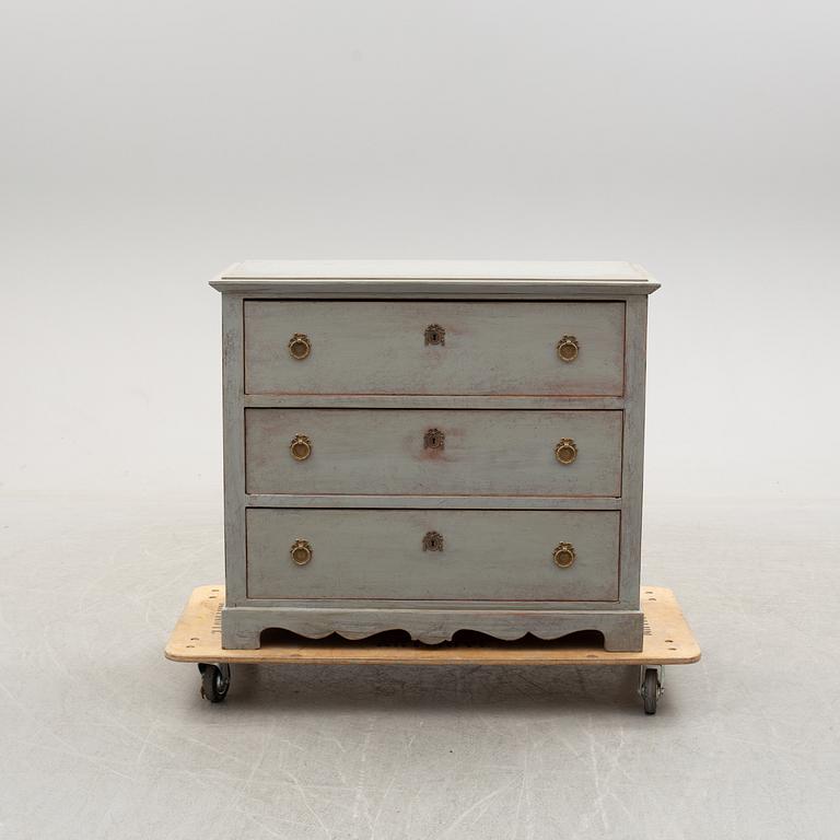 A mid 19th century painted chest of drawers.