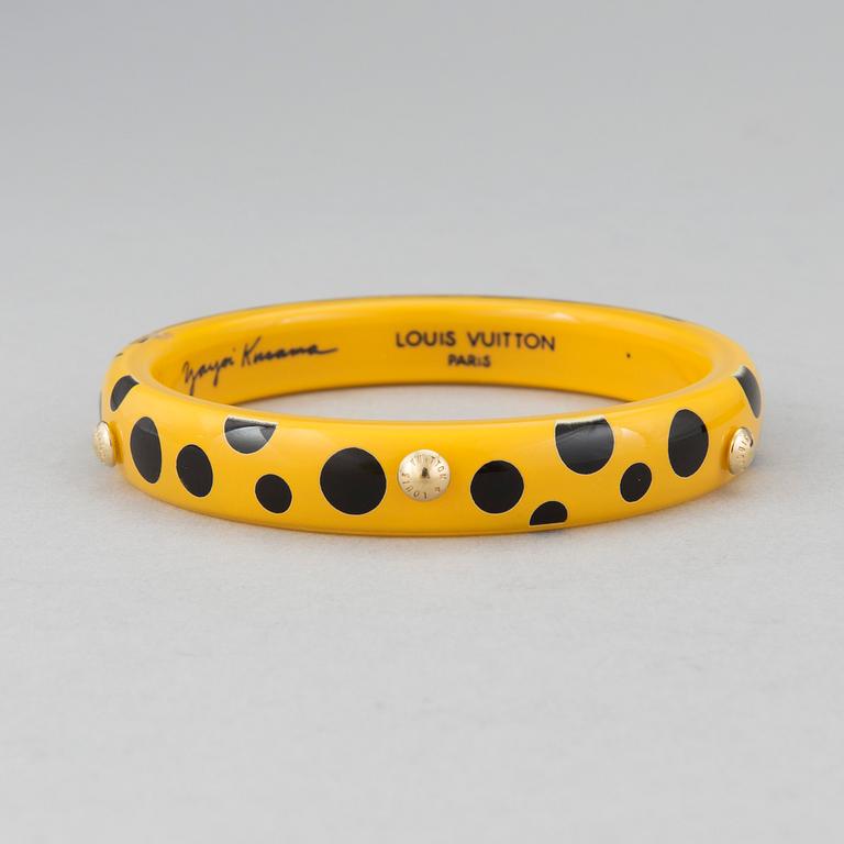 LOUIS VUITTON, Limited Edition Yayoi Kusama "Yellow Dots Infinity" Bangle PM Bracelet.