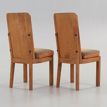 Axel Einar Hjorth, a pair of stained pine "Lovö" high back chairs, Nordiska Kompaniet, Sweden 1930´s.