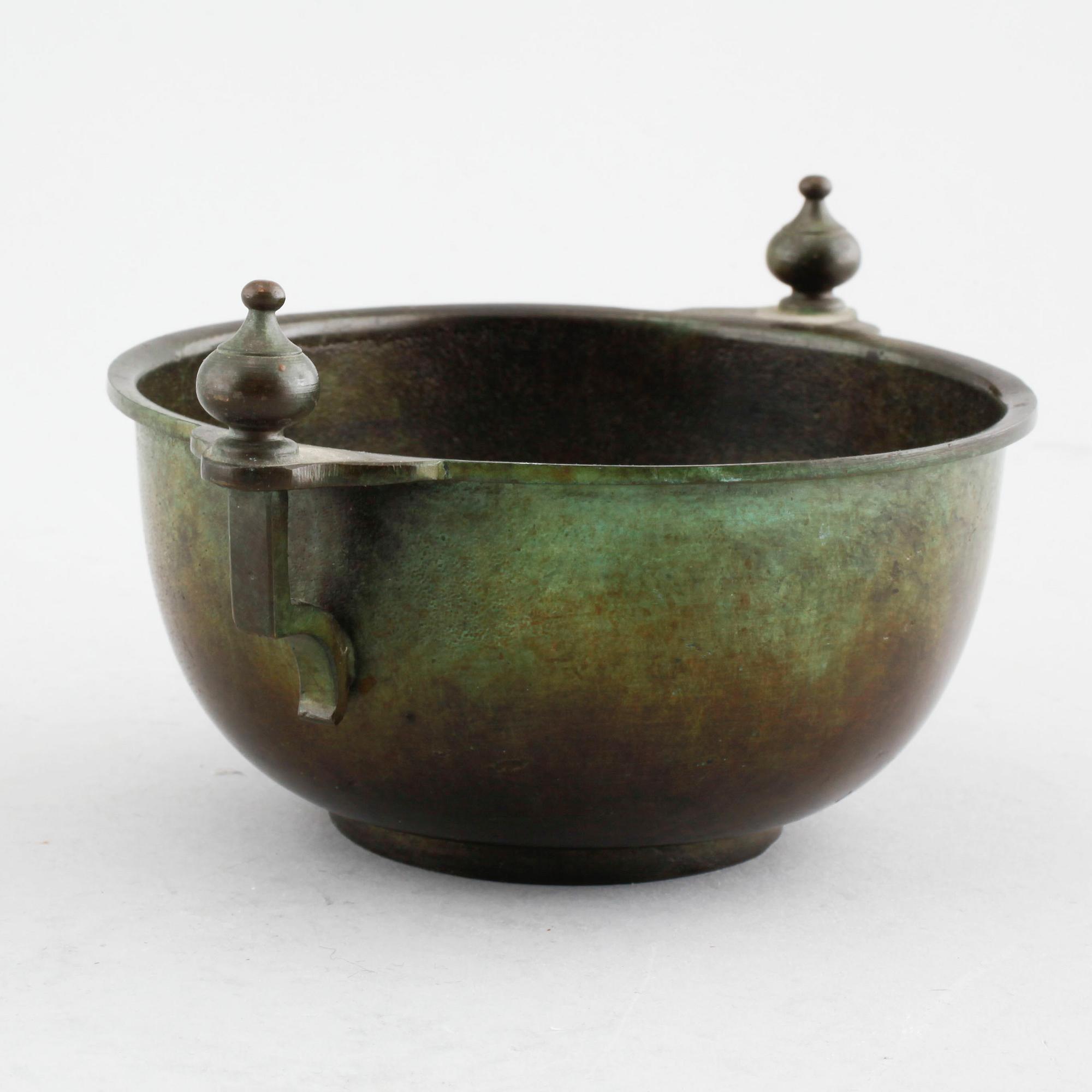 A bronze bowl by GAB, from the first half of the 20th century.