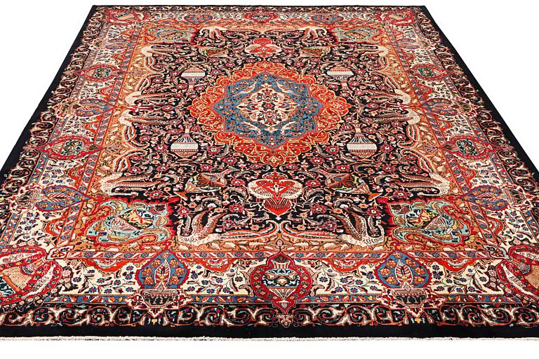 A Kashmar carpet, c. 390 x 305 cm.