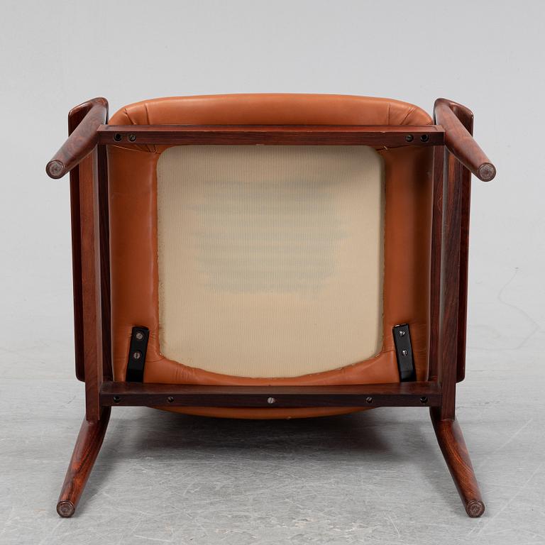 Finn Juhl, a rosewood easy chair, from Cado, Denmark, 1960's/70's.