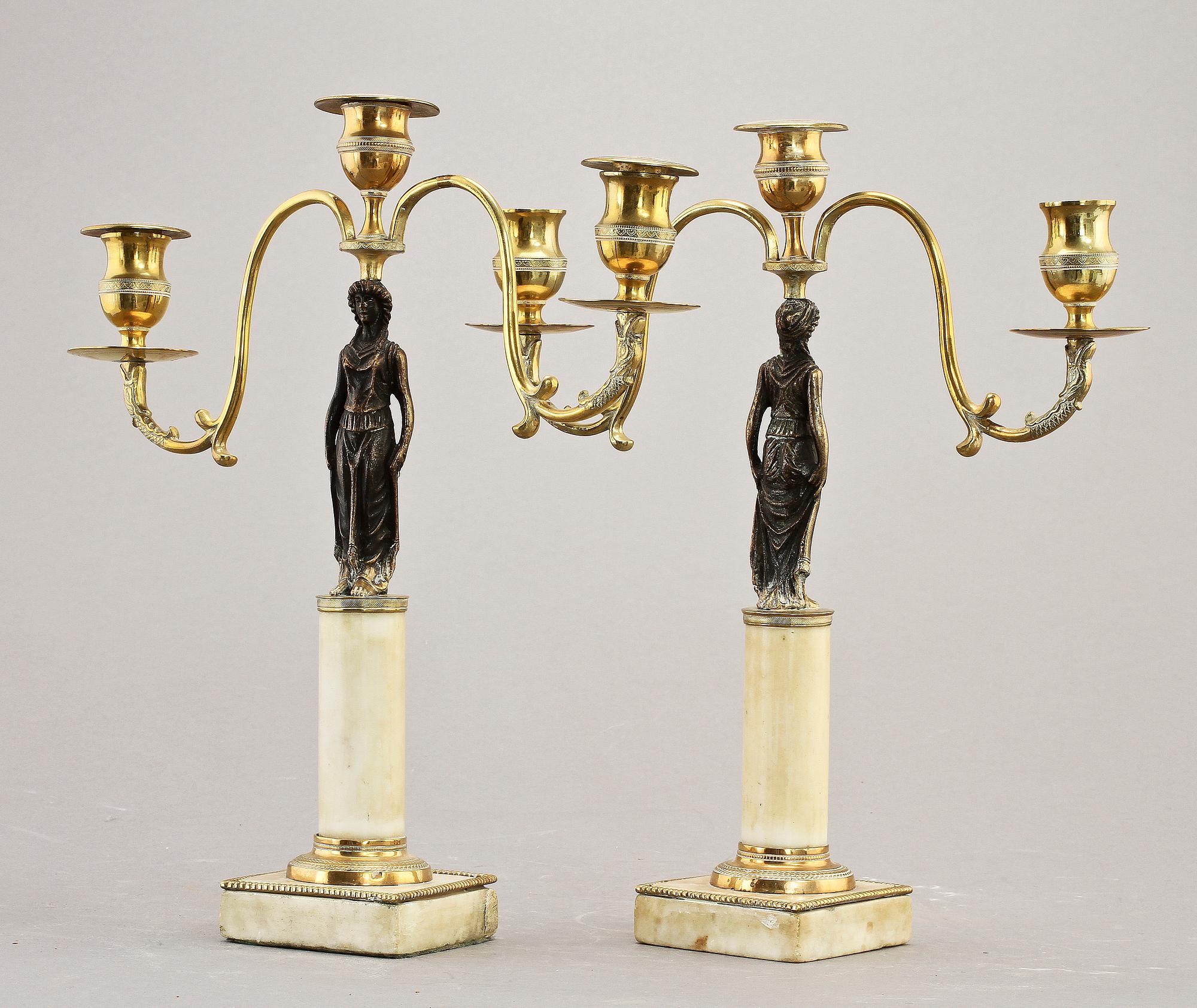 KANDELABRAR, ett par, delvis sengustavianska, 1800-tal.