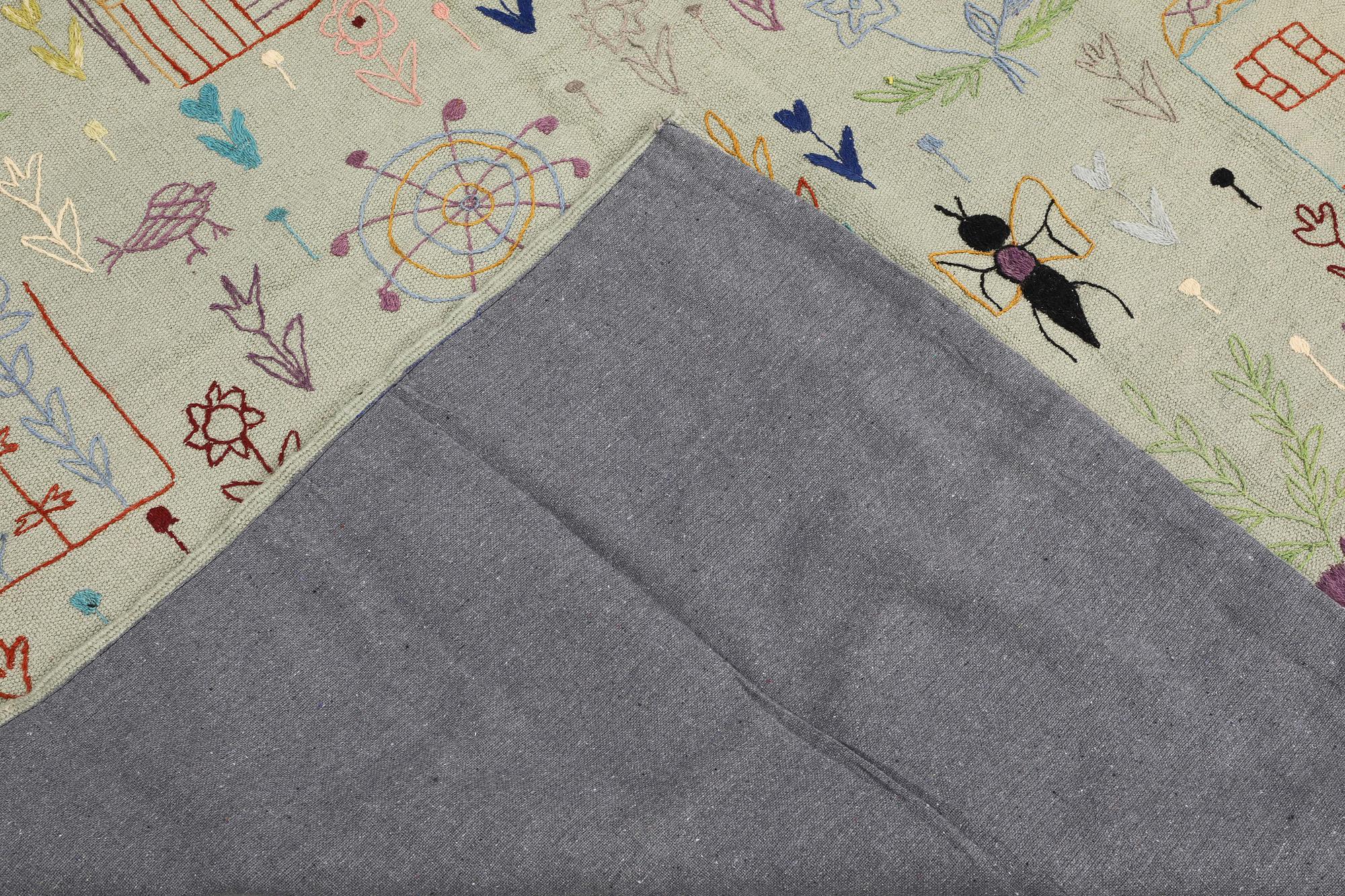 A kilim carpet with hand-embroidered decoration, 235 x 178 cm.