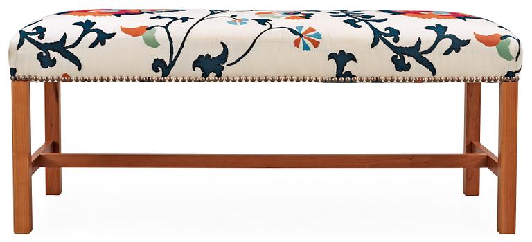 A Josef Frank cherry wood bench, Svenskt Tenn, model 2082.