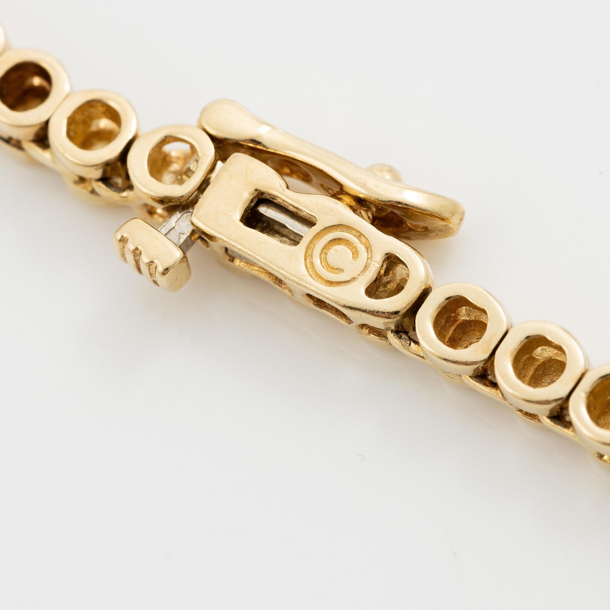A necklace 14K gold with round brilliant-cut diamonds, second half of the 20th century.