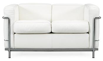 A Le Corbusier, 'LC2' chromed steel and white leather sofa by Cassina, Italy.