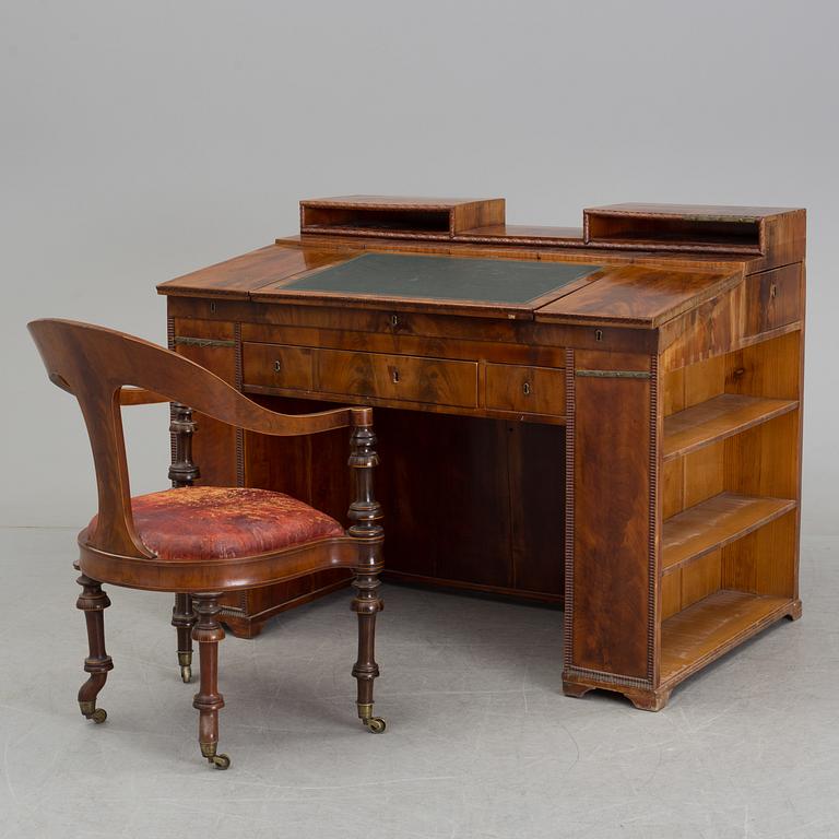 A mid 19th century writing desk and chair.