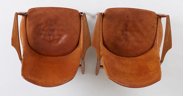 Ib Kofod Larsen, a pair of teak and cognac coloured leather "Sälen" easy chairs, Olof Perssons Fåtöljindustri (OPE), Sweden, 1950-60's.