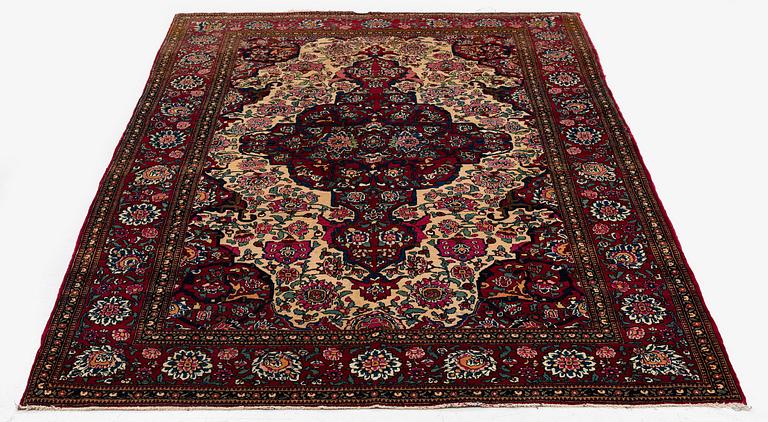 An antique Isfahan rug, Central Persia, c 234 x 146 cm.
