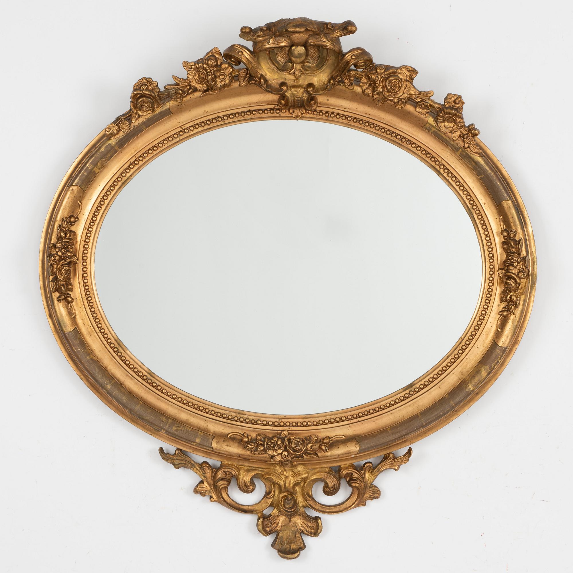 A Rococo Revival mirror, second half of the 19th century.