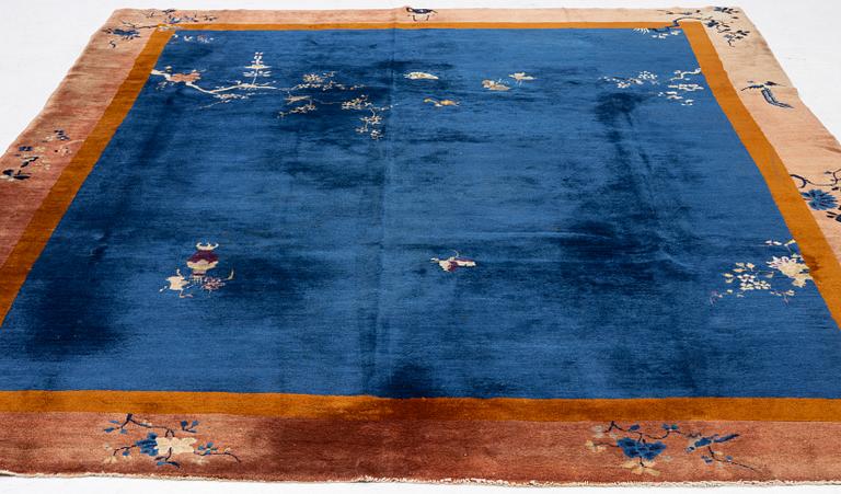 A Chinese art deco carpet, c. 327 x 278 cm.