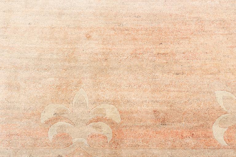 A Chinese carpet, c. 330 x 270 cm.