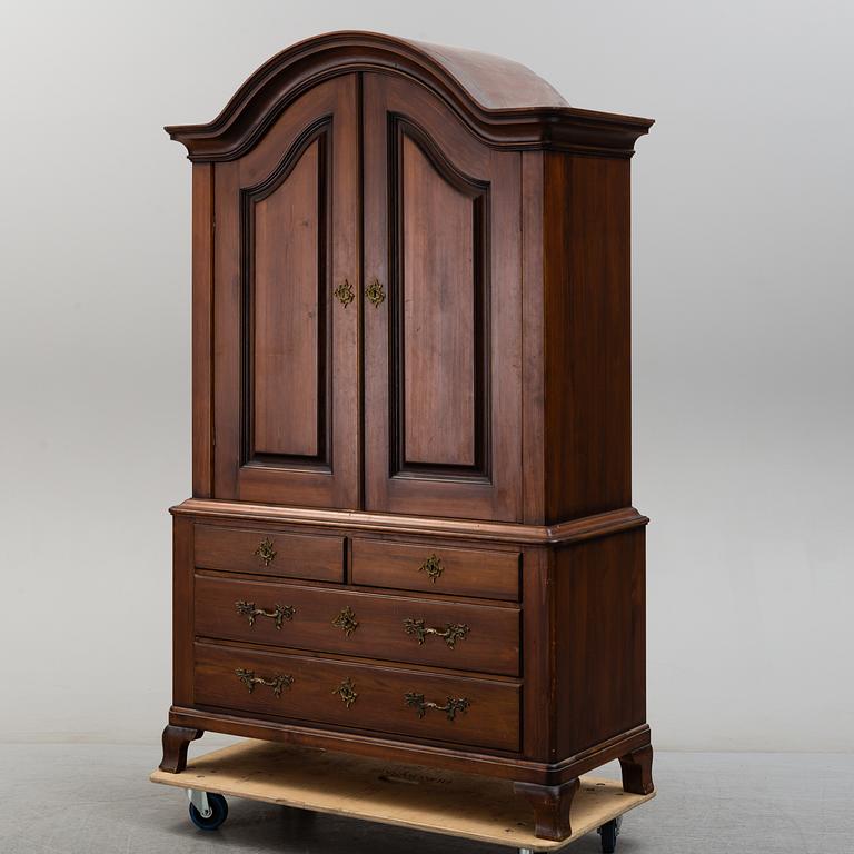 A second half of the 20th century Rococo style cabinet.