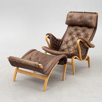 Bruno Mathsson, a "Pernilla" armchair with ottoman, Dux, Sweden.
