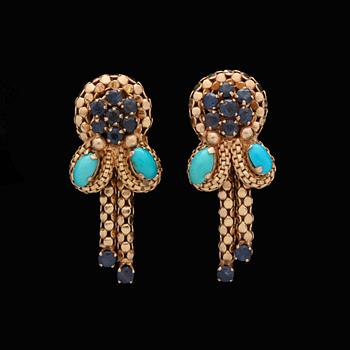 63. A pair of facett cut sapphire and turqouise earrings.